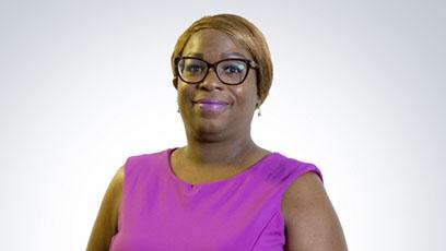 headshot of Kesha Shelton in a purple top in front of a white background