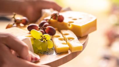 Cheese and grapes on a charcuterie board