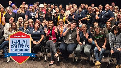 employee group photo with the Great Colleges Honor Roll logo