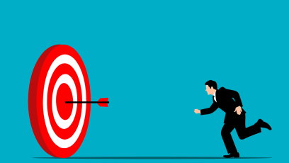 Cartoon image of a man running toward a large target with an arrow in the bullseye position
