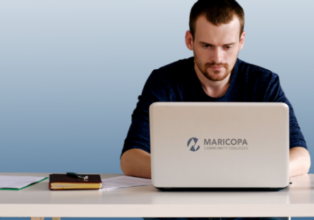 Pipeline AZ Man looking at a laptop screen