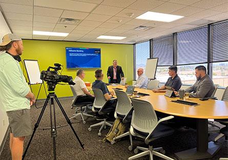 PBS NewsHour film crew in class with teacher and instructor