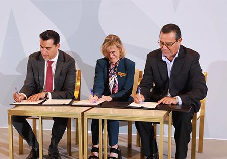 President Kate signing the MOU