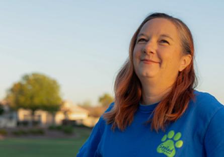 headshot of Tara Lopez smiling into the sky