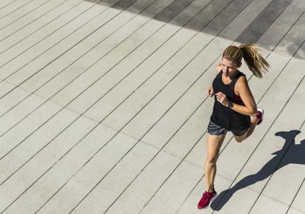 A woman running outdoors