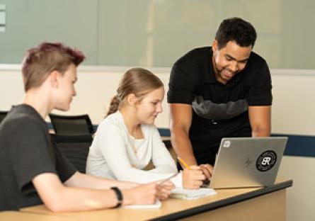 Rio graduate in the classroom teaching math to secondary education students